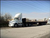 48' tri-axle flat deck with piggyback moffett mounty forklift