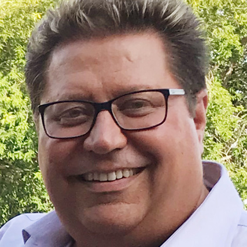 A headshot of a Convoy employee